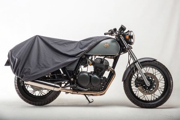 How a motorcycle cover should fit A perfectly fitted motorcycle cover that is snug but not tight